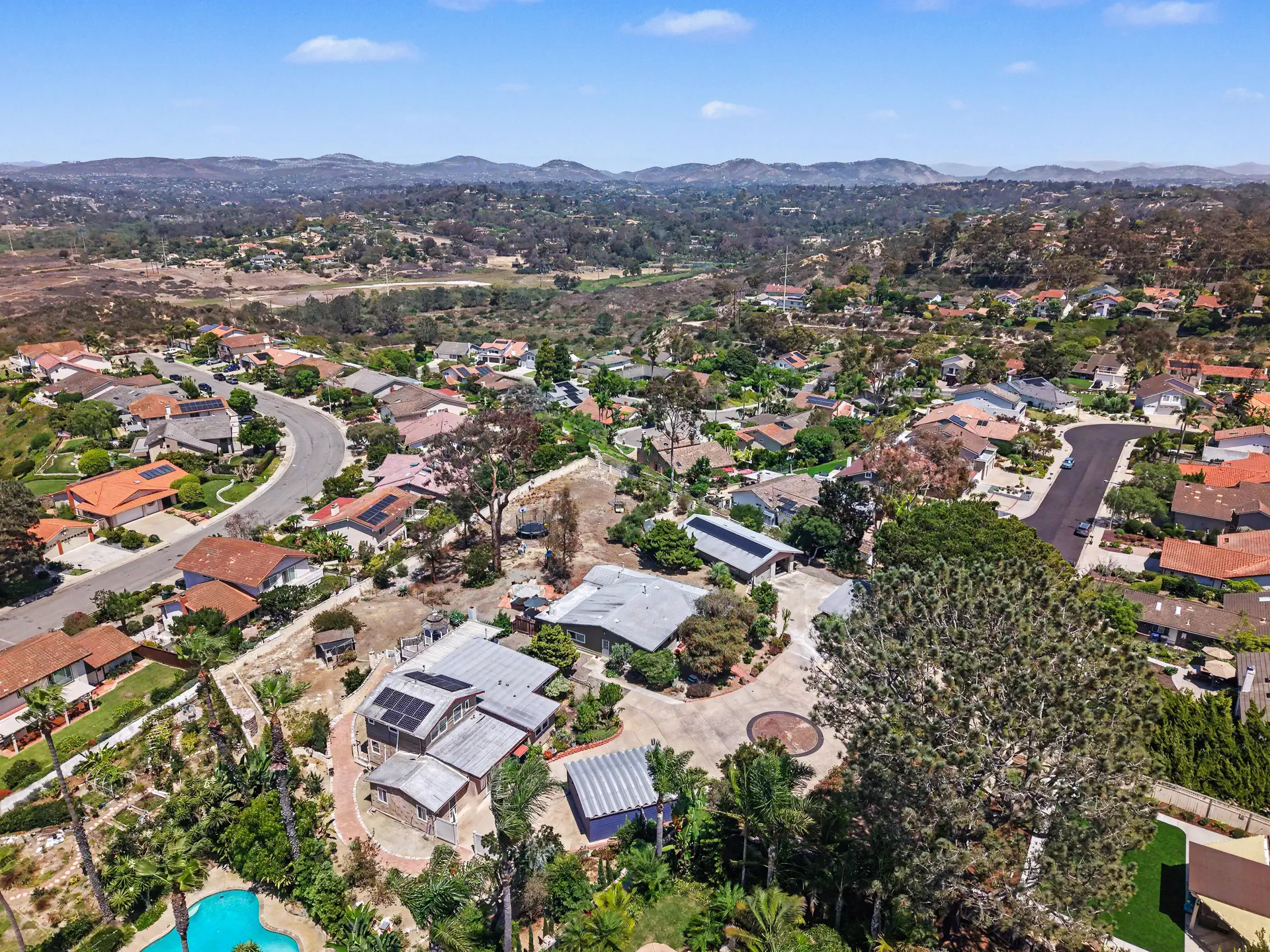 Aerial view of the eastern hills and protected open space beyond the neighborhood.